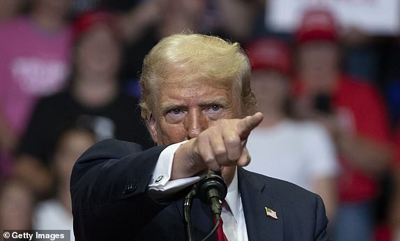 GRAND RAPIDS, MICHIGAN - JULY 20: Republican Presidential nominee former President Donald J. Trump holds his first public campaign rally with his running mate, Republican Vice Presidential nominee U.S. Senator J.D. Vance (R-OH) (not pictured), at the Van Andel Arena on July 20, 2024 in Grand Rapids, Michigan.  This is also Trump's first public rally since he was shot in the ear during an assassination attempt in Pennsylvania on July 13. Photo by Bill Pugliano/Getty Images)