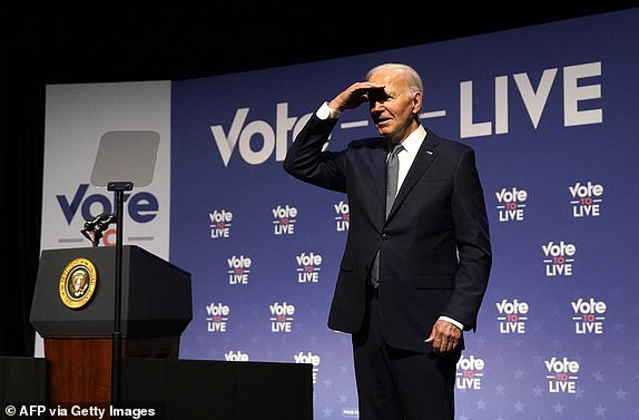 (FILES) US President Joe Biden gestures near the podium during the Vote To Live Properity Summit at the College of Southern Nevada in Las Vegas, Nevada, on July 16, 2024. US President Joe Biden doubled down on his insistence that he will stay in the White House race, despite a growing Democrat revolt that raised speculation he could bow out as soon as this weekend. "The stakes are high, and the choice is clear. Together, we will win," the 81-year-old said in a written statement on July 19, 2024 from the Delaware beach home where he is recovering from Covid. (Photo by Kent Nishimura / AFP) (Photo by KENT NISHIMURA/AFP via Getty Images)