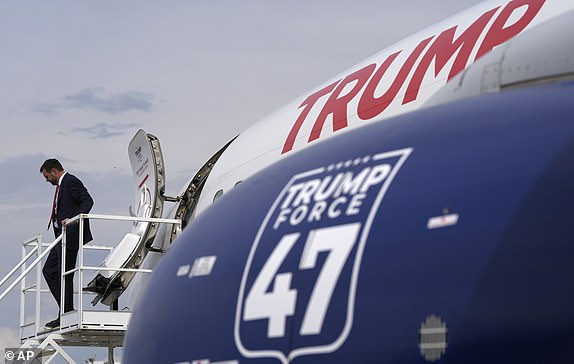 Republican vice presidential candidate Sen. JD Vance, R-Ohio, disembarks Trump Force Two at Roanoke-Blacksburg Regional Airport, Monday, July 22, 2024, in Roanoke, Va. (AP Photo/Julia Nikhinson)