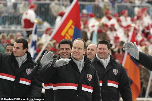 Prince Albert waving to crowds during the opening ceremony of the 1998 Winter Olympics