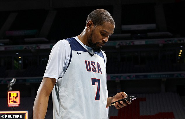 Durant appeared more interested in his phone at one stage of the practice session