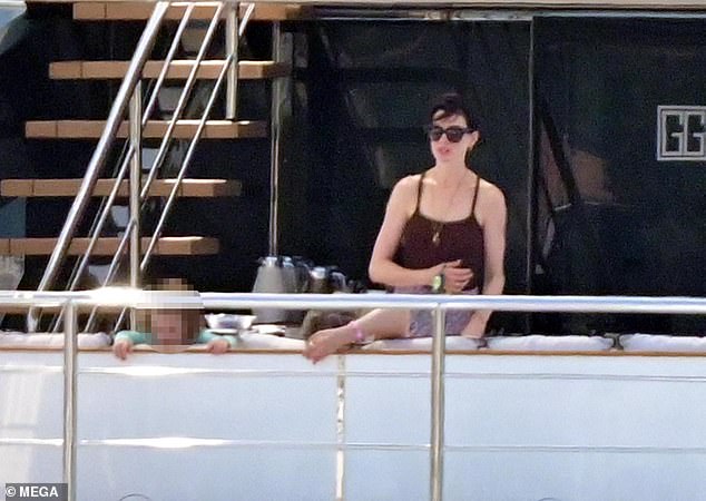 Anne Hathaway, 41, enjoyed a relaxing yacht day with her husband Adam Shulman and their sons on Tuesday, after jetting to Greece for a family holiday