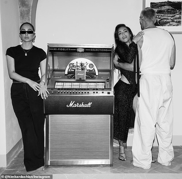 The day prior she also shared a trio of black-and-white shots in the outfit, captioned, 'late nite in Italy'