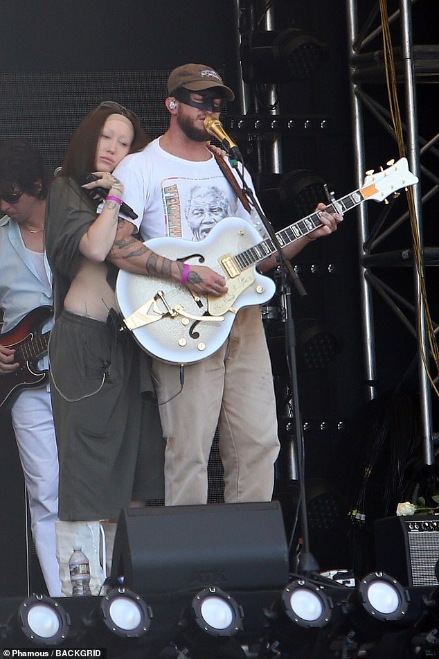 Noah was also pictured on stage as she rehearsed for that evening's performance, a duet with the masked country singer Orville Peck