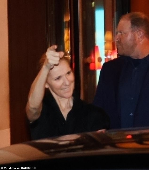 Celine - who is yet to officially comment on the speculation - looked chic in a black dress while arriving back at her accommodation