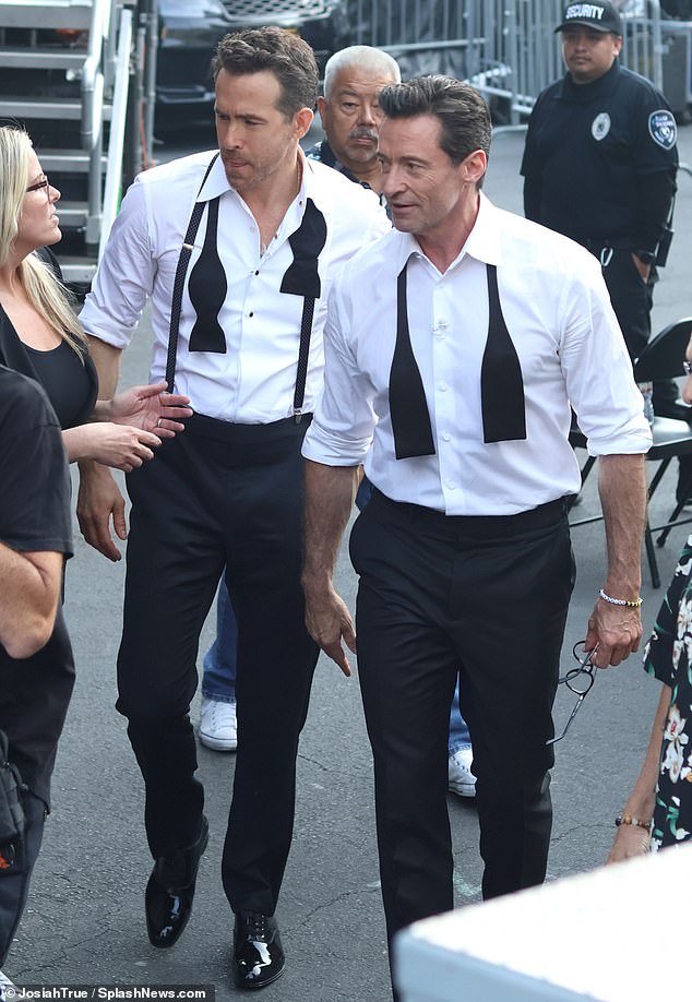 Ryan and Hugh looked stylish as they arrived on set to guest host Jimmy Kimmel Live! in dapper suits and bow ties, waving and chatting to fans in the crowd