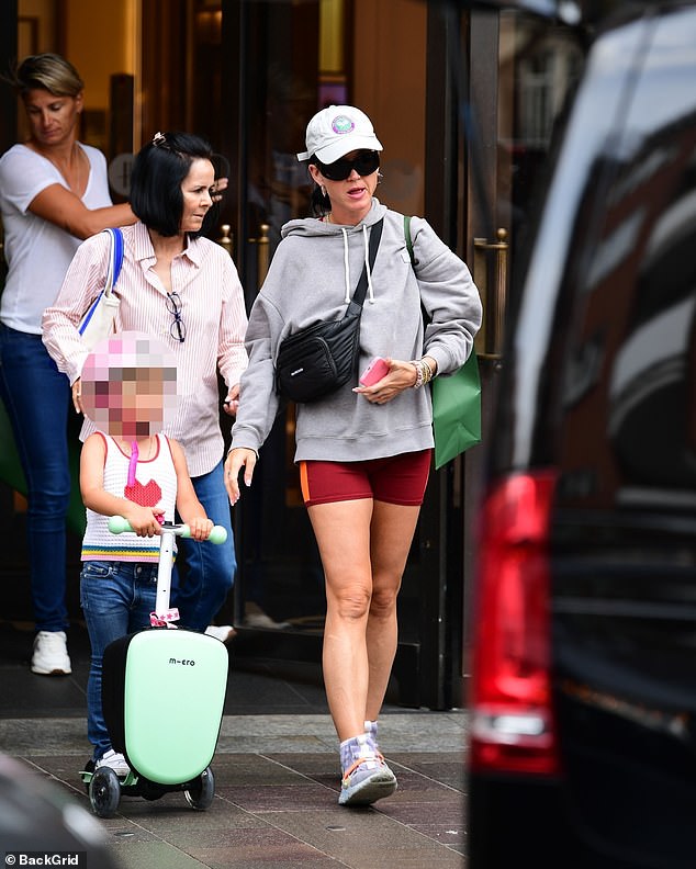 Katy Perry put on a leggy display as she went shopping at Harrods with her fiancé Orlando Bloom on Wednesday