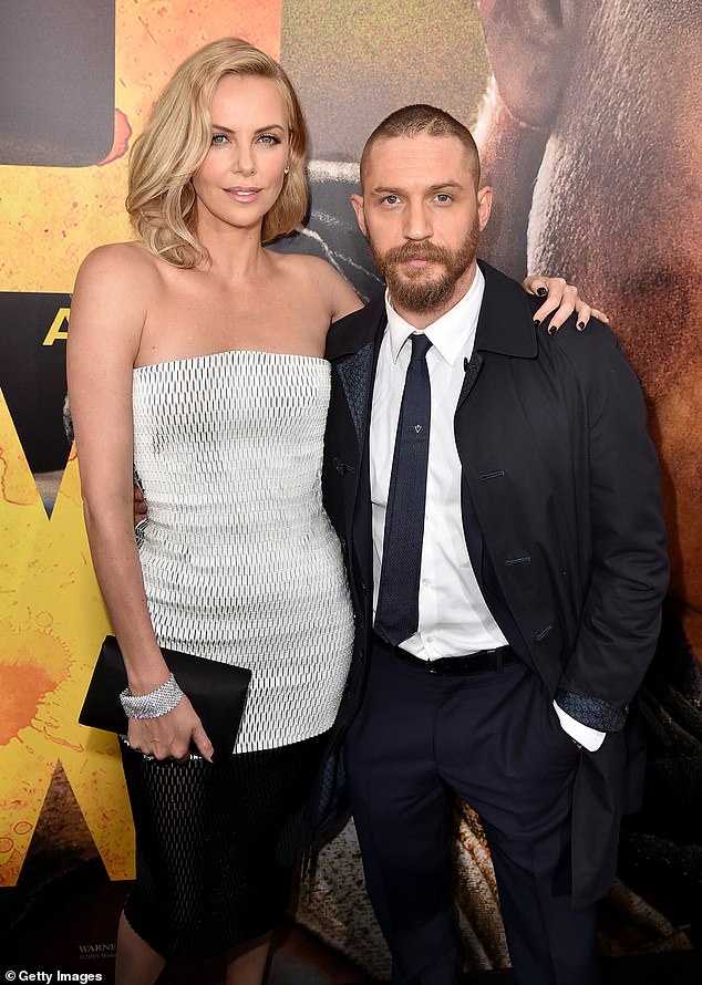 It was reported that their working relationship devolved to the point that the stars got into shouting matches, with Charlize calling Tom a 'f***ing c***' after he made her wait on set for hours (pictured together in 2015)