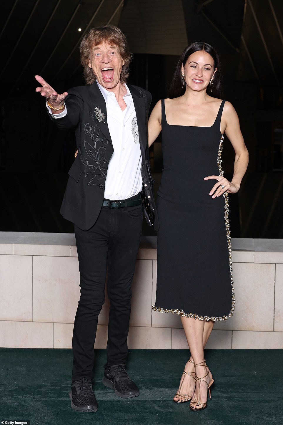 Mick Jagger, 80, put on an animated display alongside partner Melanie Hamrick, 37