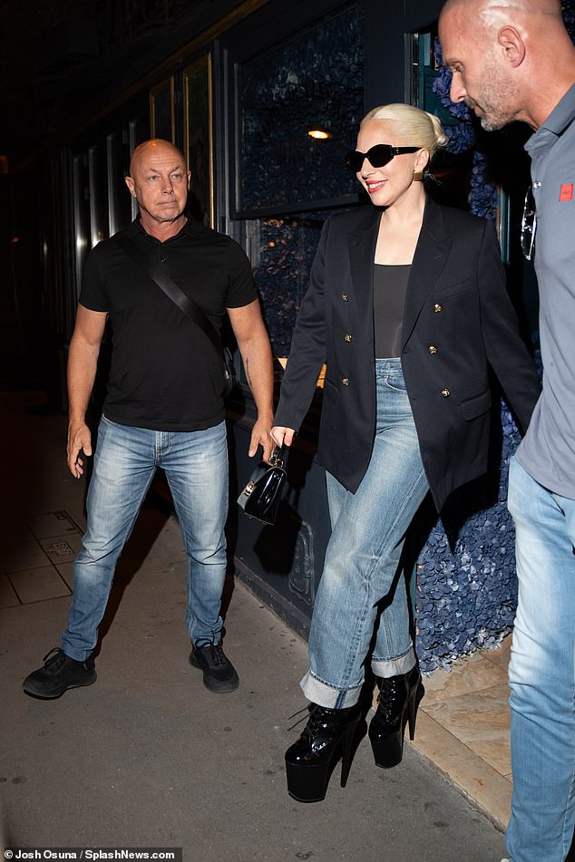 The singer was all smiles as she departed Laperouse restaurant in the French capital, wearing a smart double breasted blazer and straight leg jeans