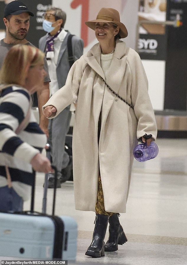 Kate Walsh (pictured) was showing off her chic fashion sense as she arrived at Sydney Airport on Friday