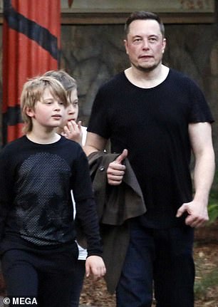 Vivian, born Xavier Musk, and her twin brother Griffin (pictured with Elon in 2017) are the Tesla CEO's eldest living children