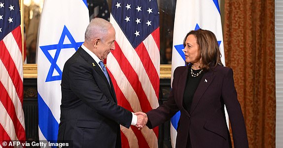 TOPSHOT - US Vice President Kamala Harris meets with Israeli Prime Minister Benjamin Netanyahu in the Vice President's ceremonial office at the Eisenhower Executive Office Building in Washington, DC, on July 25, 2024. (Photo by ROBERTO SCHMIDT / AFP) (Photo by ROBERTO SCHMIDT/AFP via Getty Images)