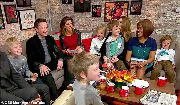 Musk (second from left) and Wilson shared five children together. Vivian, then Xavier, is pictured sitting on a couch to CBS Mornings host Norah O'Donnell (right of Musk) in February 2014. She is also accompanied by her siblings