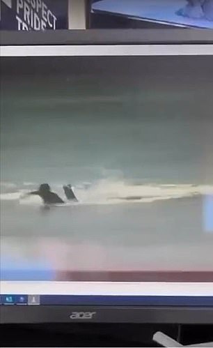 The leaked video shows a surfer frantically paddling