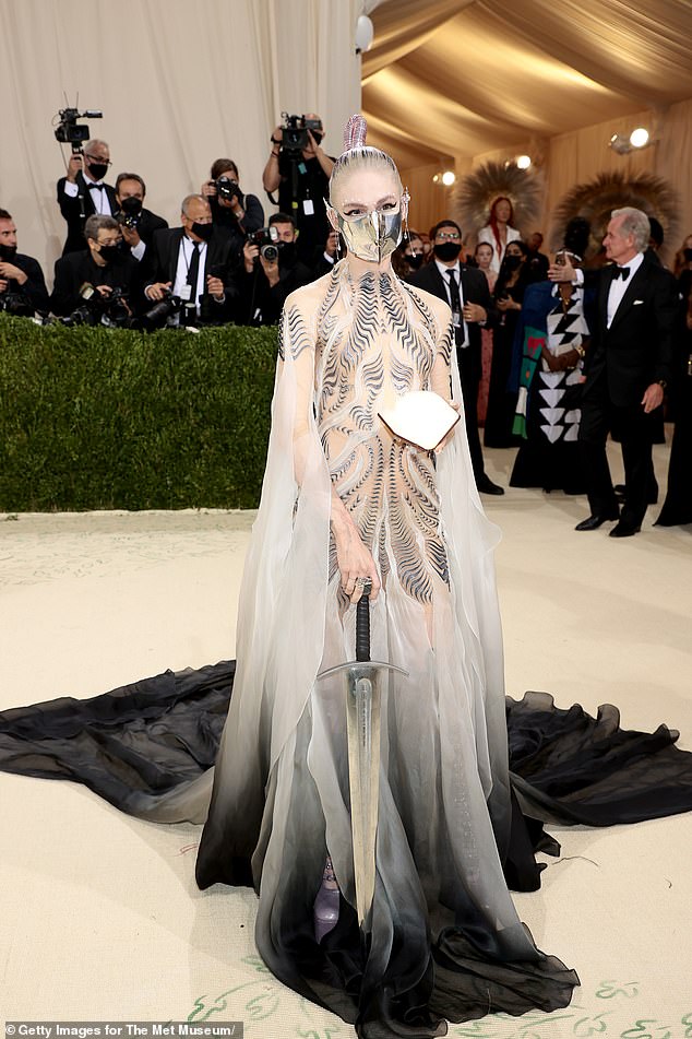 This past April, it appeared the two were once again on good terms, based on an exceedingly brief exchange on X. Grimes is seen brandishing a sword at Manhattan's Met Gala in 2021