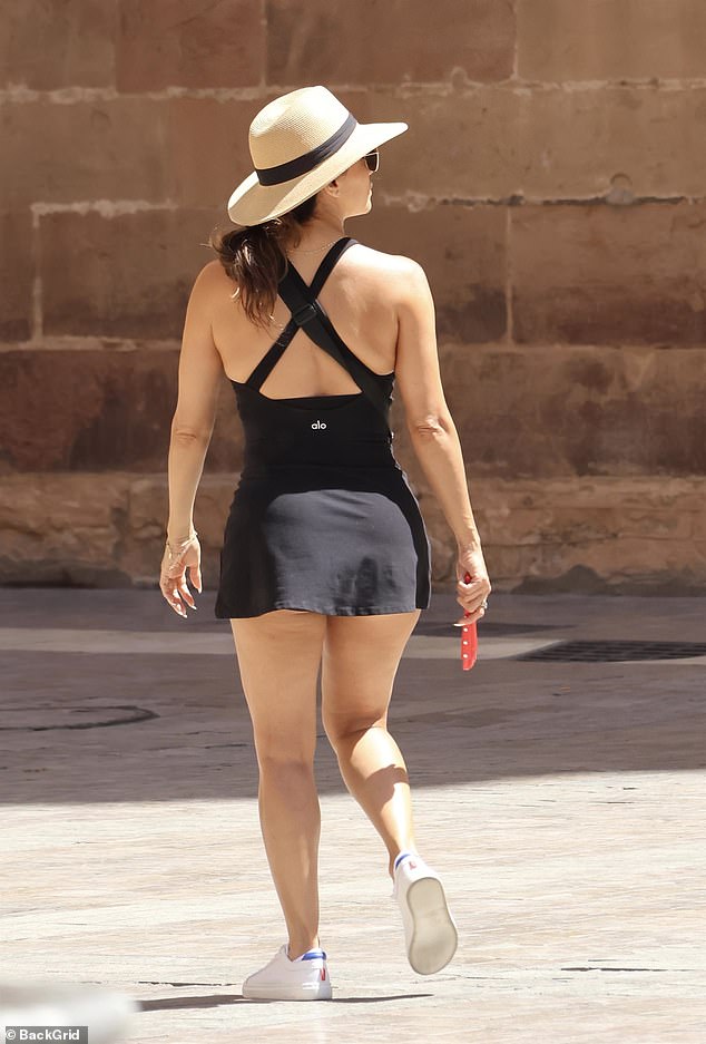 The couple, who share six-year-old Santiago, took in the sights of the Spanish town as they battled the heat, with Eva carrying around a red fan to keep herself cool