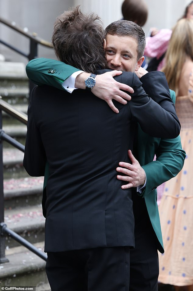 The Rolling Stones star shared a big hug with his son after the ceremony