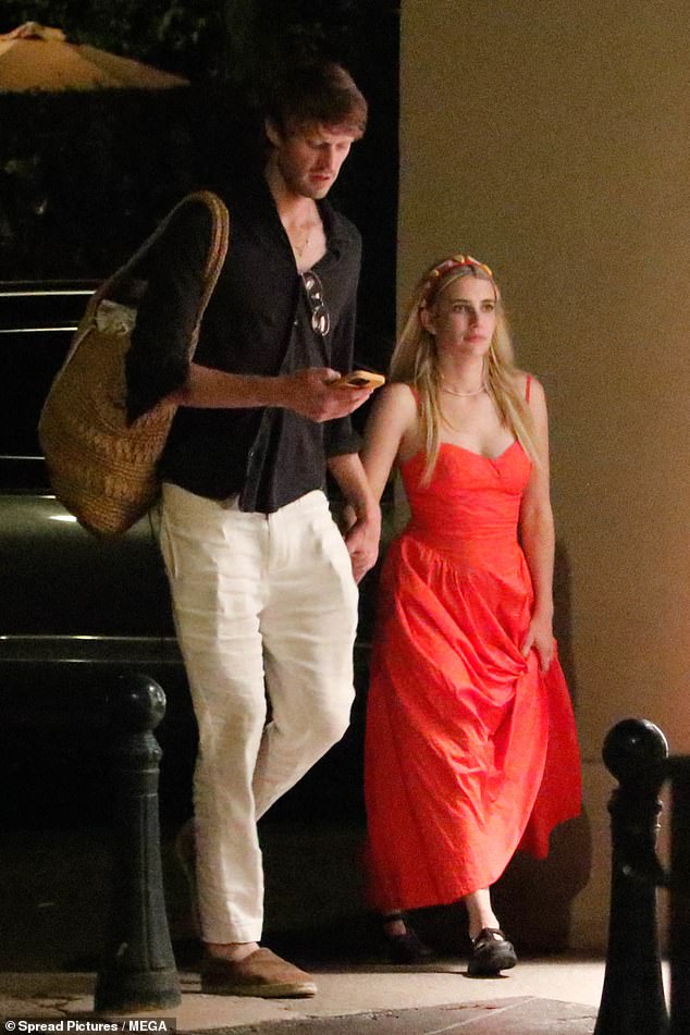 Emma Roberts, 33, packed on the PDA with her fiancé Cody John as the loved-up couple queued up for ice cream in Saint Tropez, continuing their French holiday together