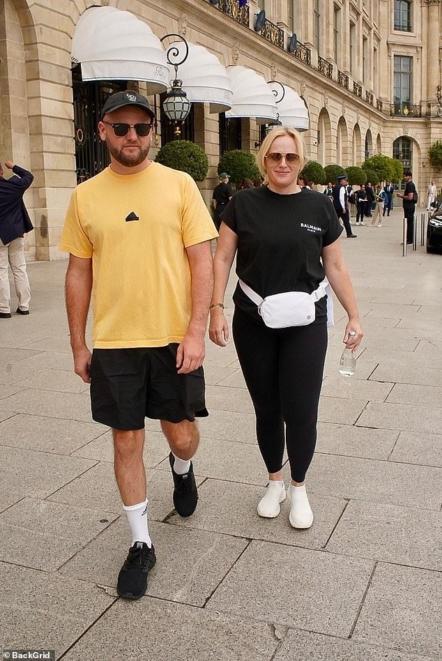 Rebel Wilson rocked a black Balmain T-shirt while out and about in Paris with a friend ahead of the Olympic Games 2024 opening ceremony on Friday