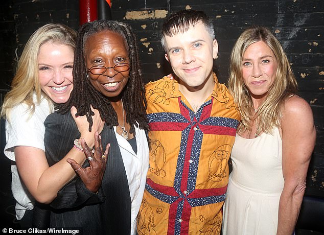 (L-R) Haines, Goldberg, Escola and Aniston pose backstage