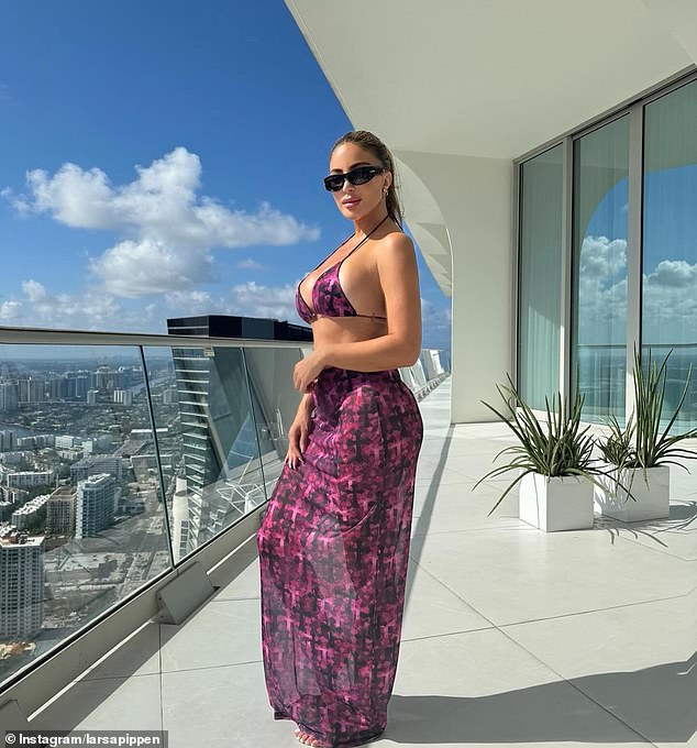 Larsa Pippen showcased her phenomenal figure in a black and purple bikini and matching sarong after confirming her split from Marcus Jordan