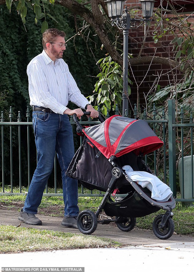 Father Stephen Scholem was this week seen pushing his grandchild, Firerose's niece, in a stroller near his home in Sydney's north