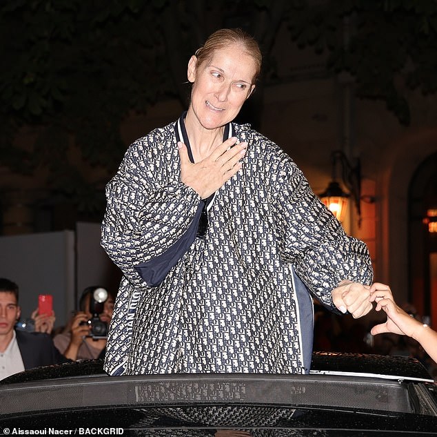 French journalist Thierry Moreau posted on Wednesday that Gaga and Celine have rehearsed the song, with Celine to don a pink-and-black feathered cape by Dior (Celine pictured in Paris on Thursday)