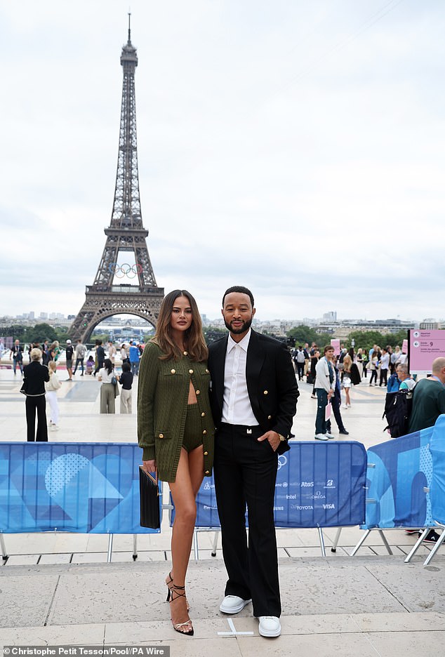 She teamed the garment with tiny hotpants that showcased her enviably toned legs, donning barely-there black heels to boost her frame further