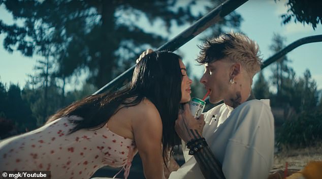 When MGK, 34, ¿ real name Colson Baker ¿ and Jelly Roll ¿ real name Jason Bradley DeFord ¿ released stills from the video on social media revealing Megan's baby bump encased in tight dresses fans were confused