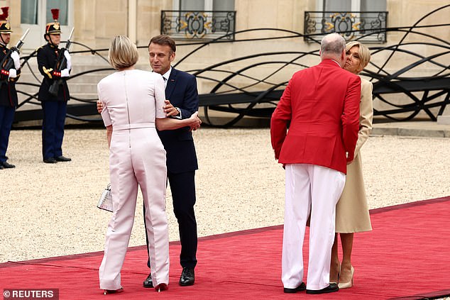 Emmanuel and his wife were full of warm greetings for the Monaco royals at the Palace earlier today