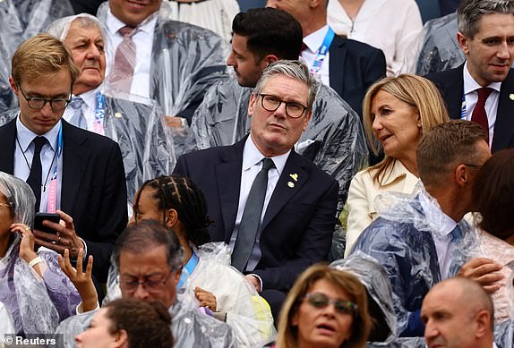 Paris 2024 Olympics - Opening Ceremony - Paris, France - July 26, 2024. Britain's Prime Minister Keir Starmer sits in the stands ahead of the opening ceremony REUTERS/Kai Pfaffenbach