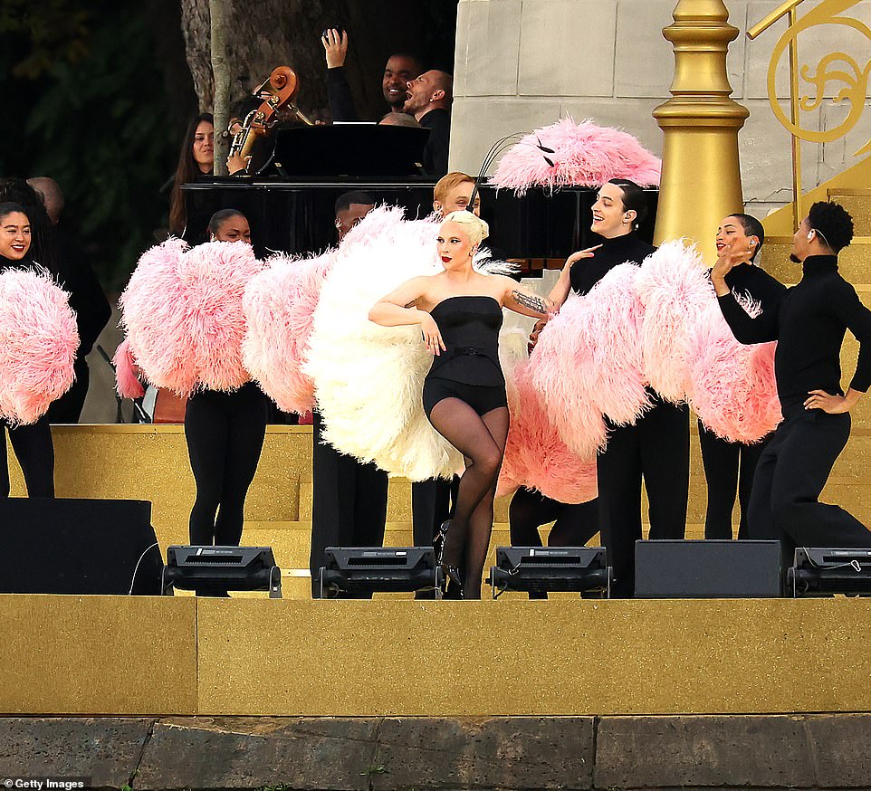 The songstress looked sensational as she performed on a sweeping staircase