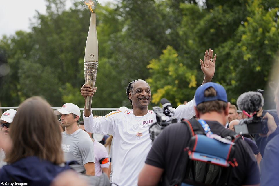 Ahead of the ceremony, Snoop Dogg was tasked with carrying the Olympic torch through Paris