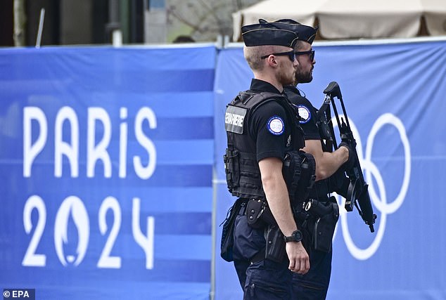 French policemen patrol amid preparations for the opening ceremony of the Paris 2024 Olympic Games, in Paris, France, July 24, 2024