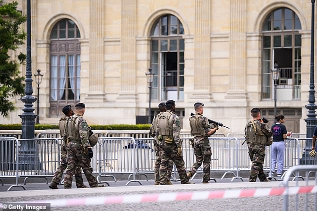 French Military patrols outside at the Louvre ahead of the Opening Ceremony for the Olympic Games Paris 2024