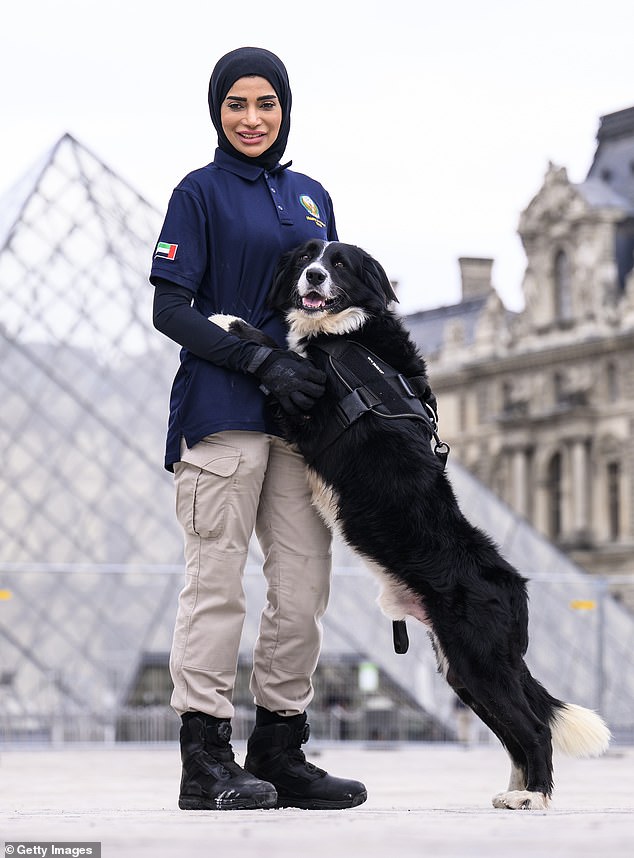 Members of the United Arab Emirates Police patrol outside at the Louvre ahead of the Opening Ceremony for the Olympic Games Paris 2024