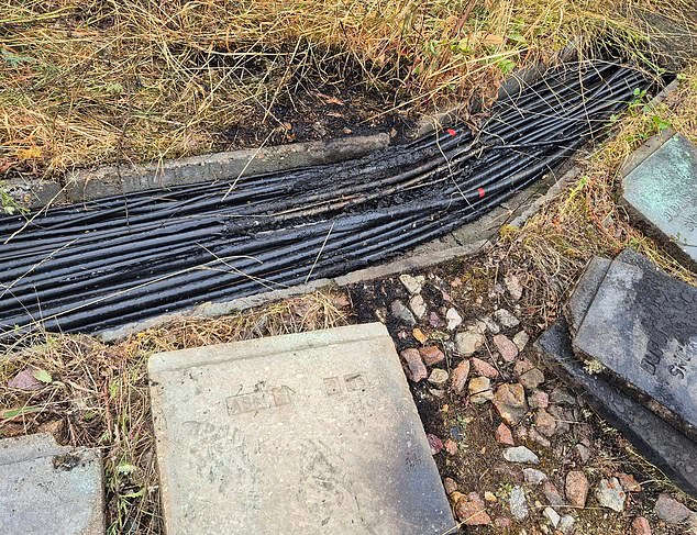 Charred cables near a railway line in Courtalain after reports of 'arson' attacks on rail infrastructure