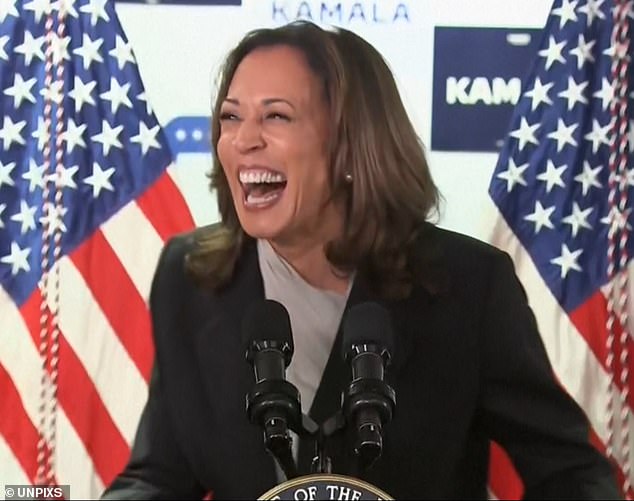 Kamala Harris was all smiles when she arrived at Joe Biden 's former Delaware campaign headquarters on Monday.