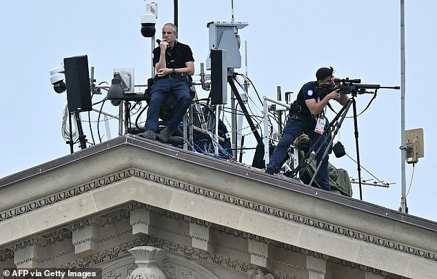 Snippers spotted on the roof of the National Assembly ahead of the opening ceremony