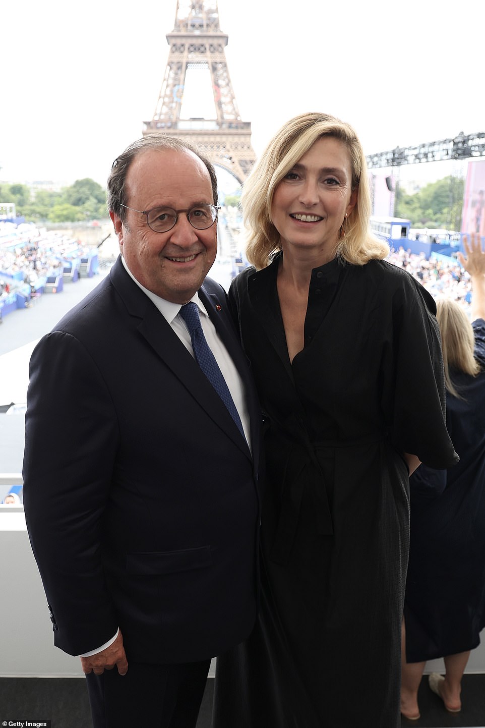 Former French President Francois Hollande and his wife Julie Gayet looked thrilled to be celebrating their home country welcoming the massive sporting event