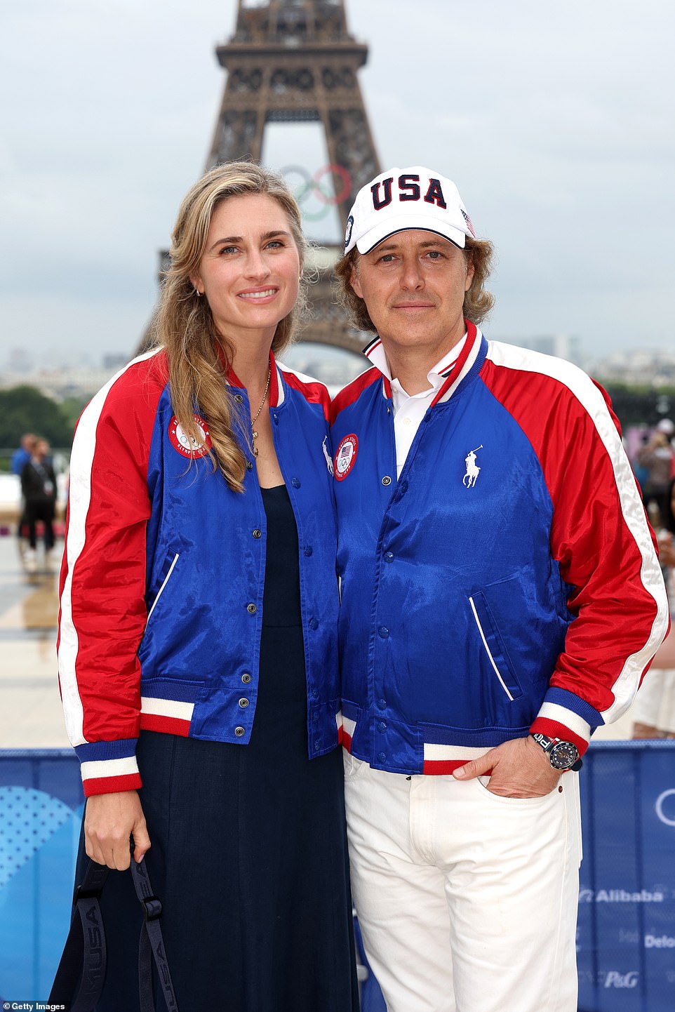 Fashion designer Lauren Bush and her husband David Lauren co-ordinated with their jackets, while the businessman opted for a patriotic cap to finish his look off