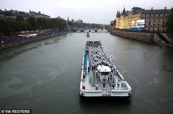 Paris 2024 Olympics - Opening Ceremony - Paris, France - July 26, 2024. Team Japan, Team Jordan, Team Kazakhstan and Team Kenya cruise on the River Seine during the athletes? parade during the opening ceremony of the Olympic Games Paris 2024. Maddie Meyer/Pool via REUTERS