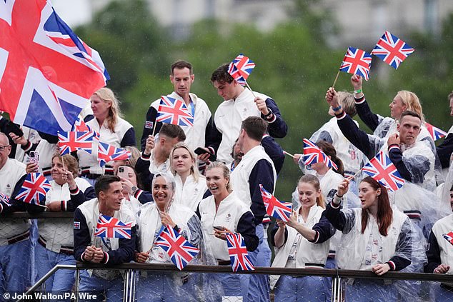 Team GB's team embraced the rain, with many opting not to bother with poncho to protect from the torrential showers