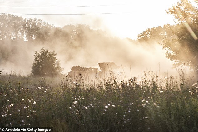 Smoke rising over the town of New York, which until the end of last month was one of the quietest sections of the front line