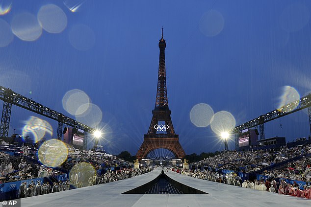 Water is pushed off the stage under the Eiffel Tower