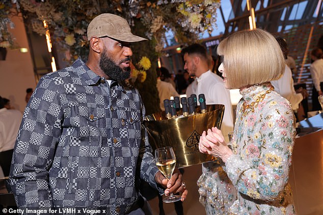 The Vogue editor was later seen chatting intensely to American basketball player LeBron James