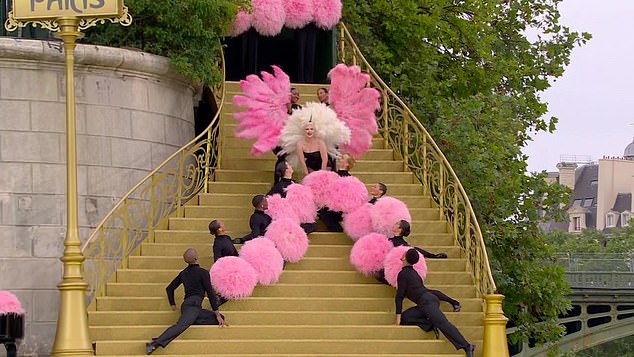 The Grammy winner continued to belt out the French-language Mon Truc en Plume (My Thing With Feathers) in a minute-long routine