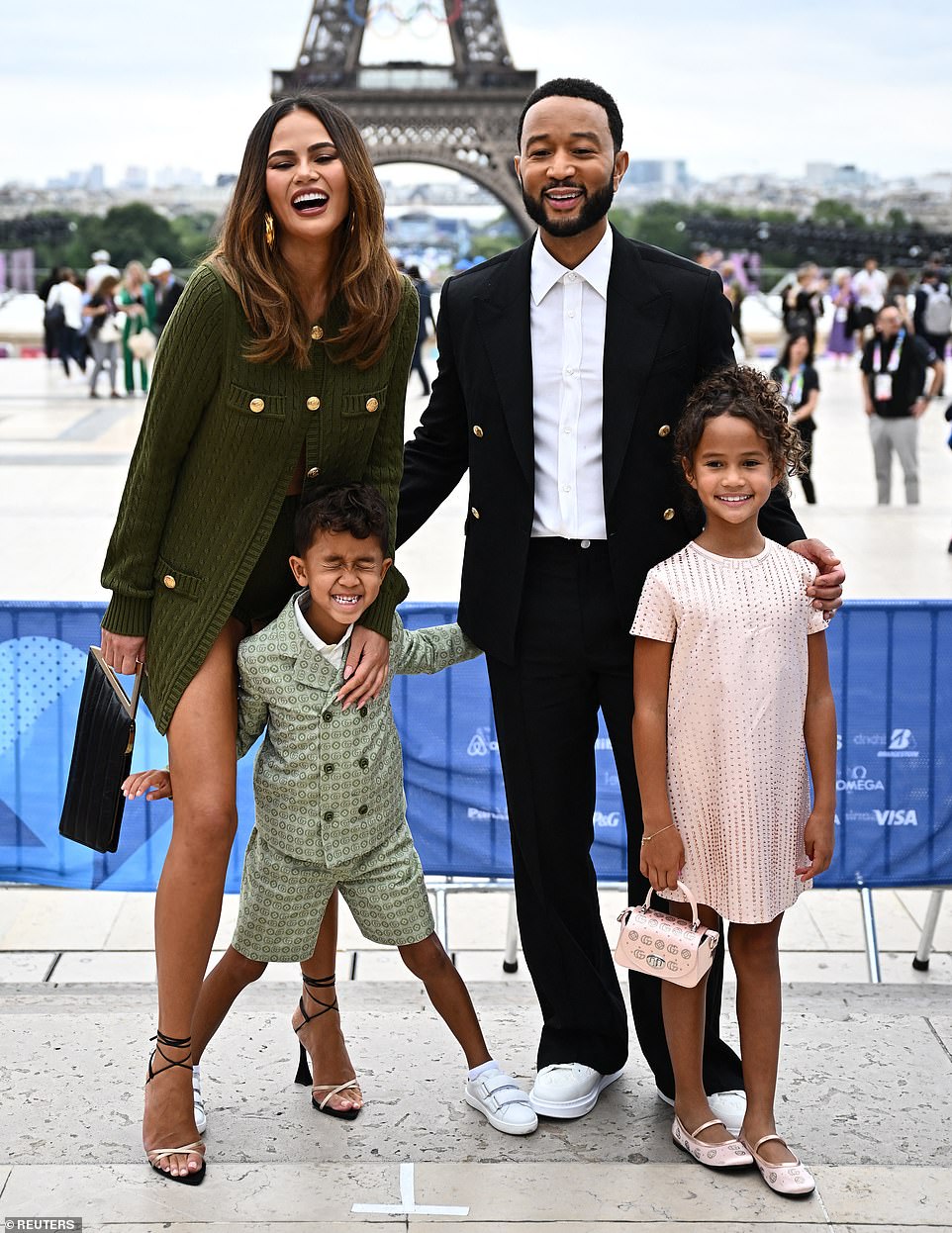 Chrissy, 38, showed off her incredible figure in a khaki co-ord while posing up a storm with her adorable family