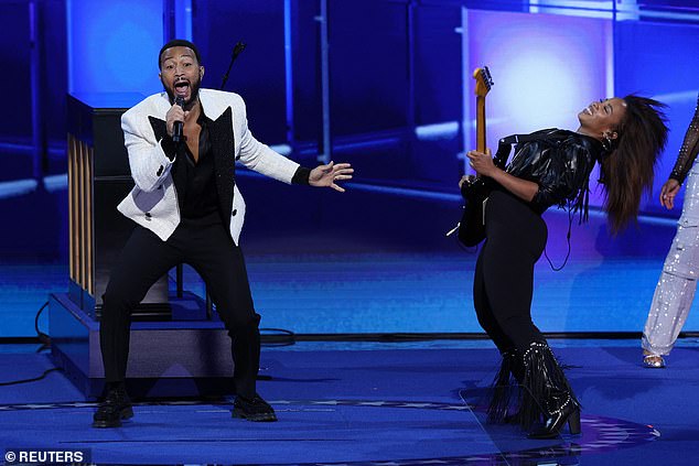 John Legend performing a Prince tribute at the Democratic National Convention in a nod to Tim Walz' home state of Minnesota